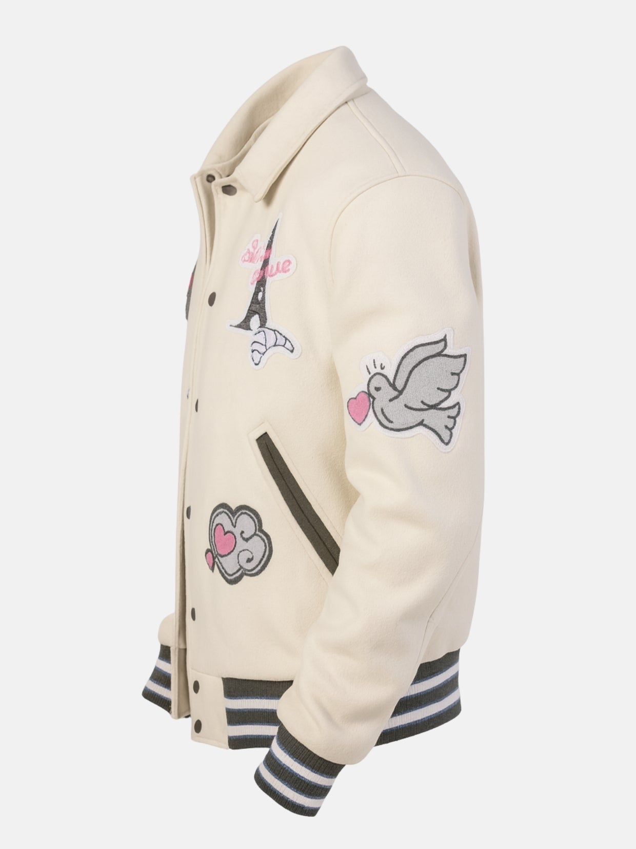 Flat side view of beige varsity jacket showing shirt collar and heart patches