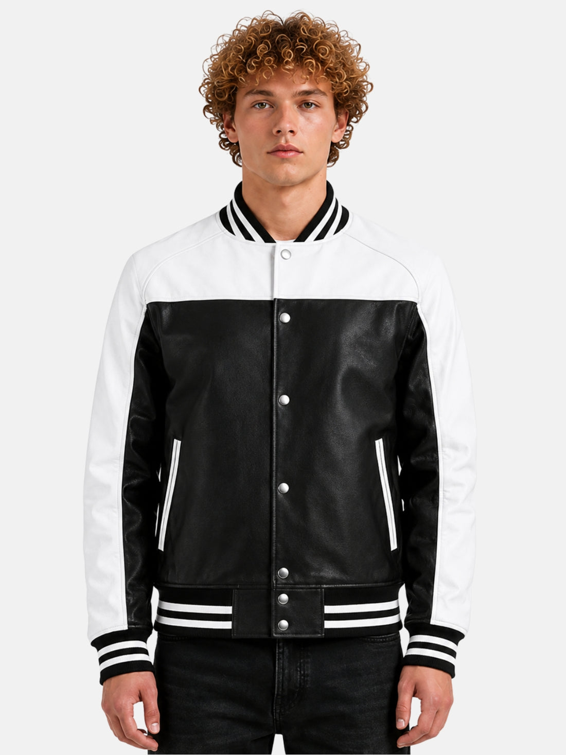Man wearing black and white leather varsity jacket with snap front