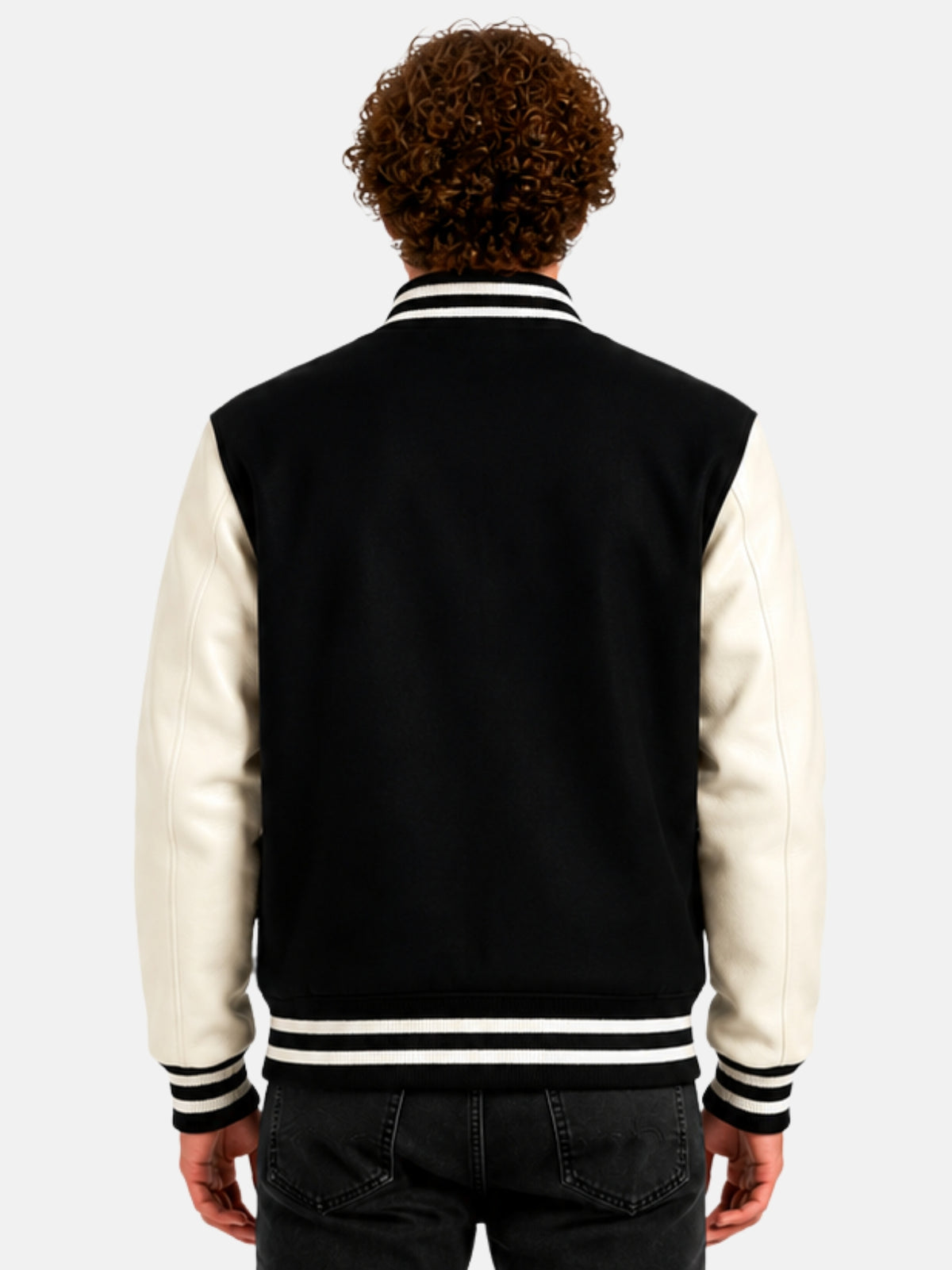 Back view of black and white varsity jacket with clean, patch-free back panel