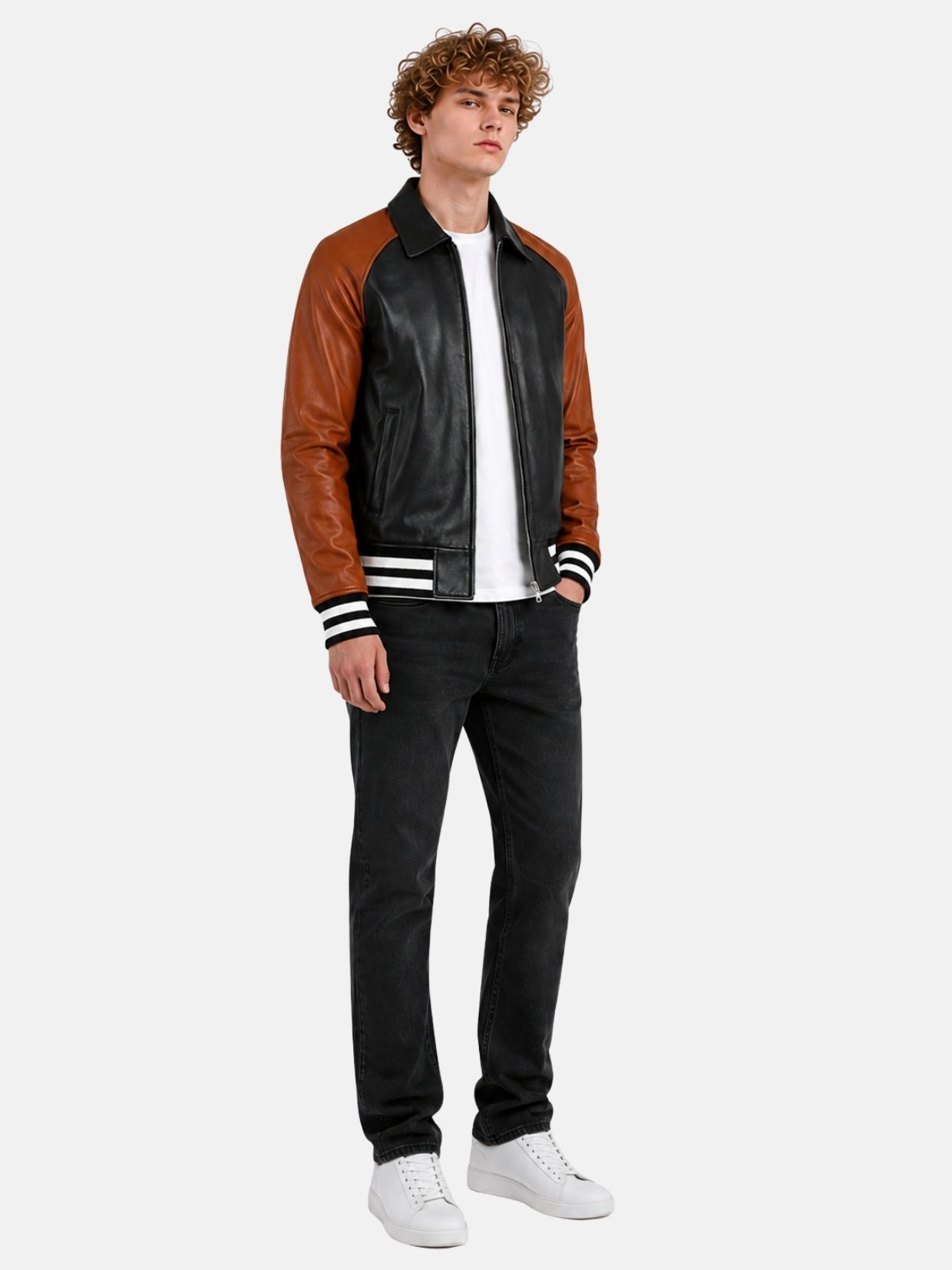 Full-length look with black and brown leather varsity jacket over white tee