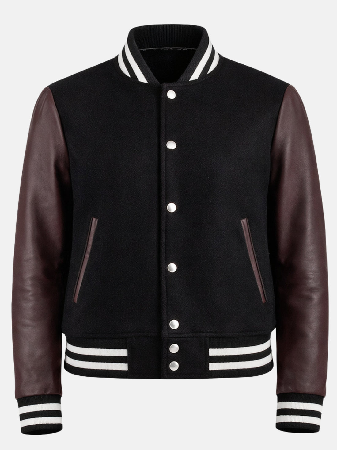 Woman wearing a black varsity jacket with burgundy leather sleeves and striped trims