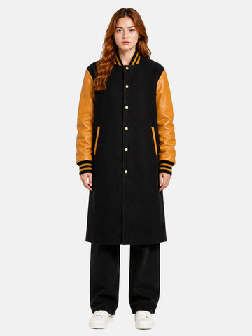 Women's black and gold bomber varsity coat, front view