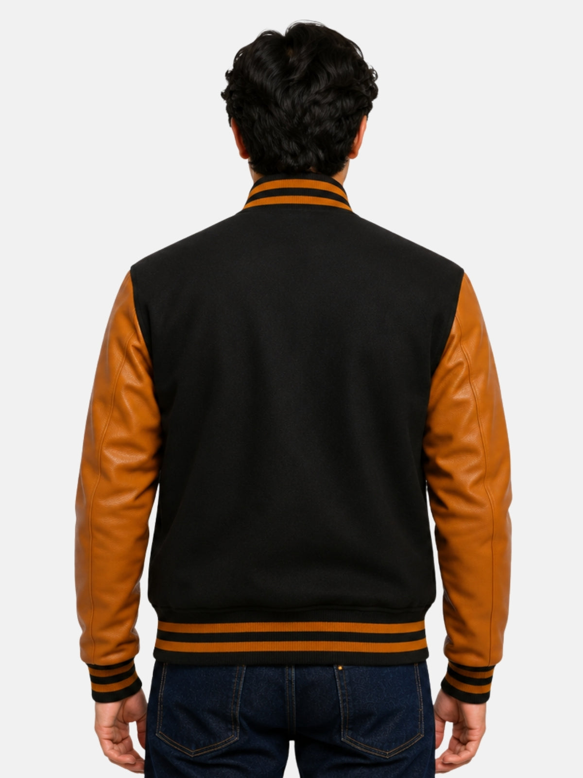 Model showing plain black back of varsity jacket with gold cowhide sleeves