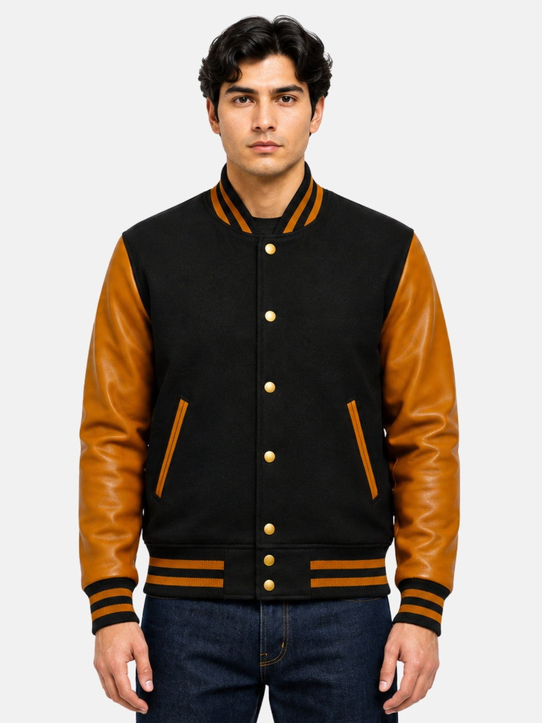Man wearing black and gold varsity jacket in size Medium with dark denim, front view