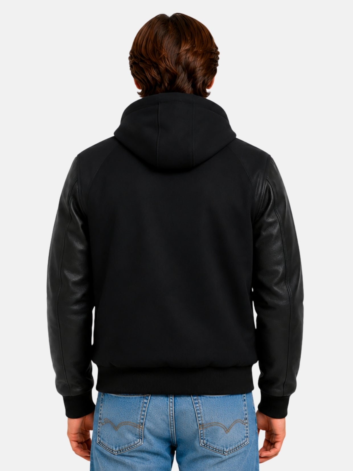 Model showing back of black hooded wool varsity jacket with leather sleeves