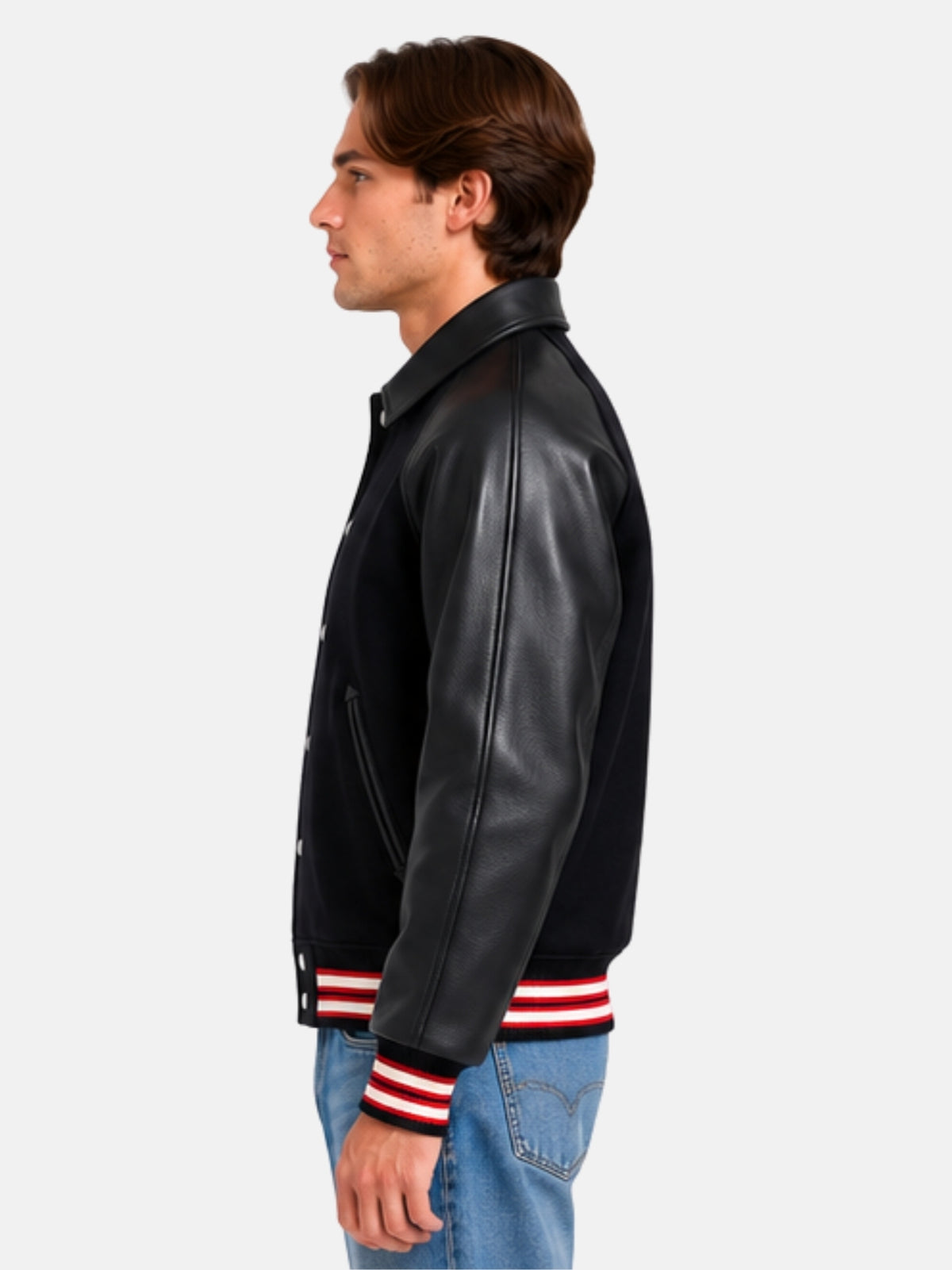 Side profile of black varsity jacket with leather shirt collar and raglan sleeve on model