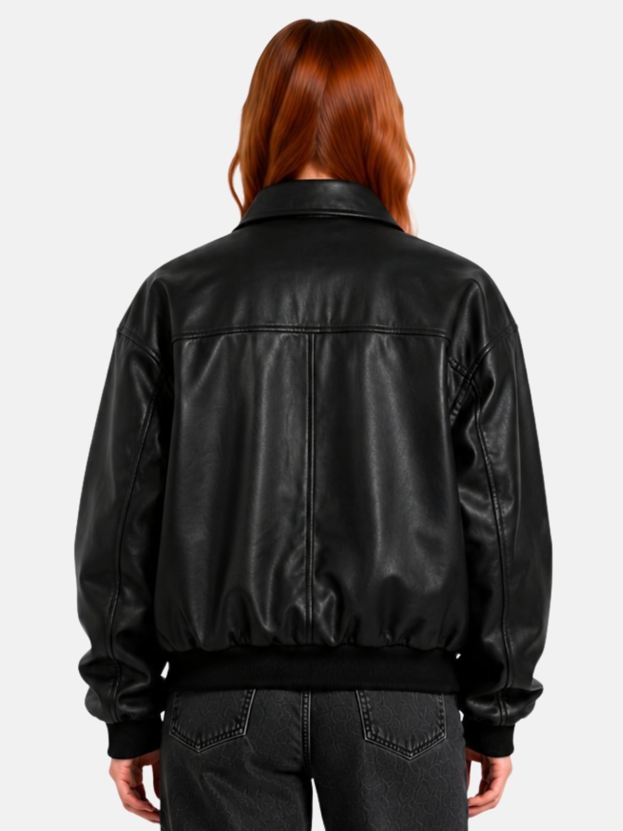 Back view of black leather bomber jacket showing horizontal yoke seam