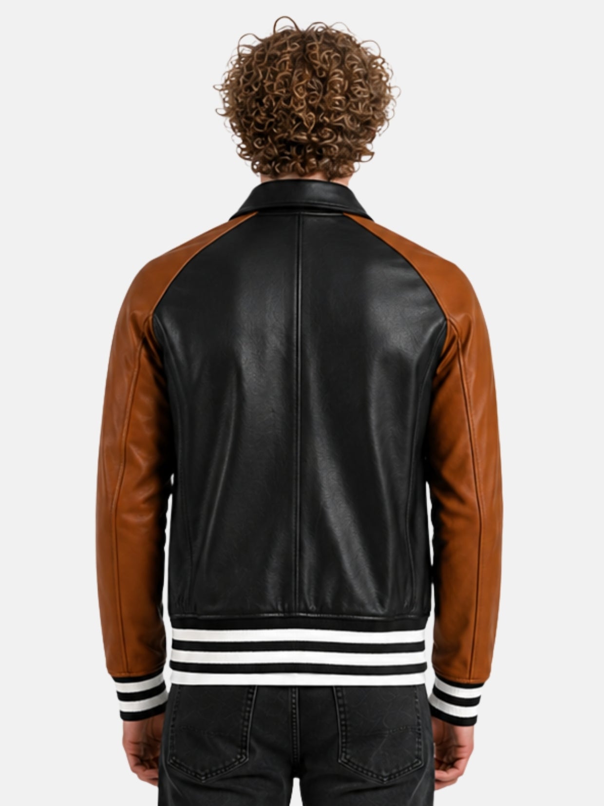 Model showing back of black leather varsity jacket with brown raglan sleeves