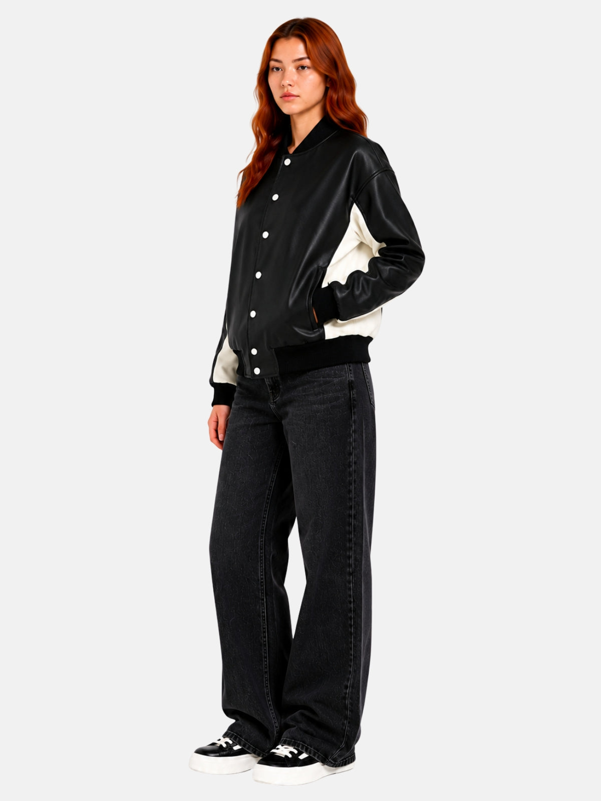 Full-length view of fitted black leather jacket with cream contrast panels