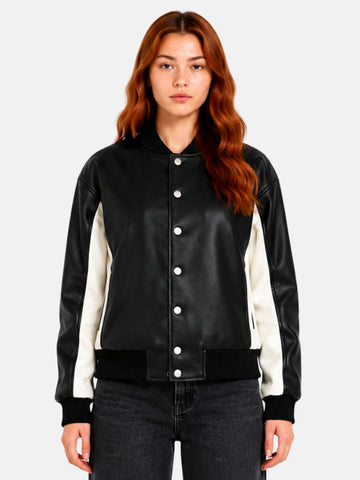 Black leather jacket with cream side panels and silver snap buttons on model