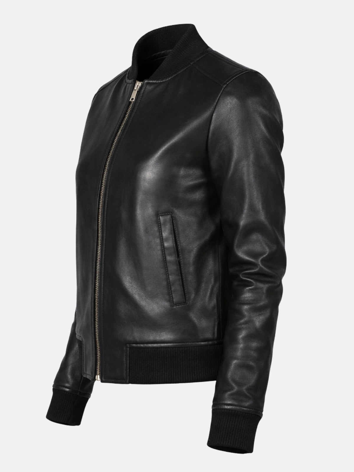Angled flat lay of black leather jacket showing zipper pull and ribbed cuff detail