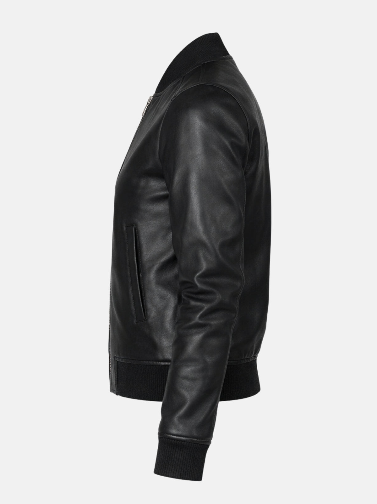 Flat lay side view of black leather jacket highlighting angled welt pocket cut
