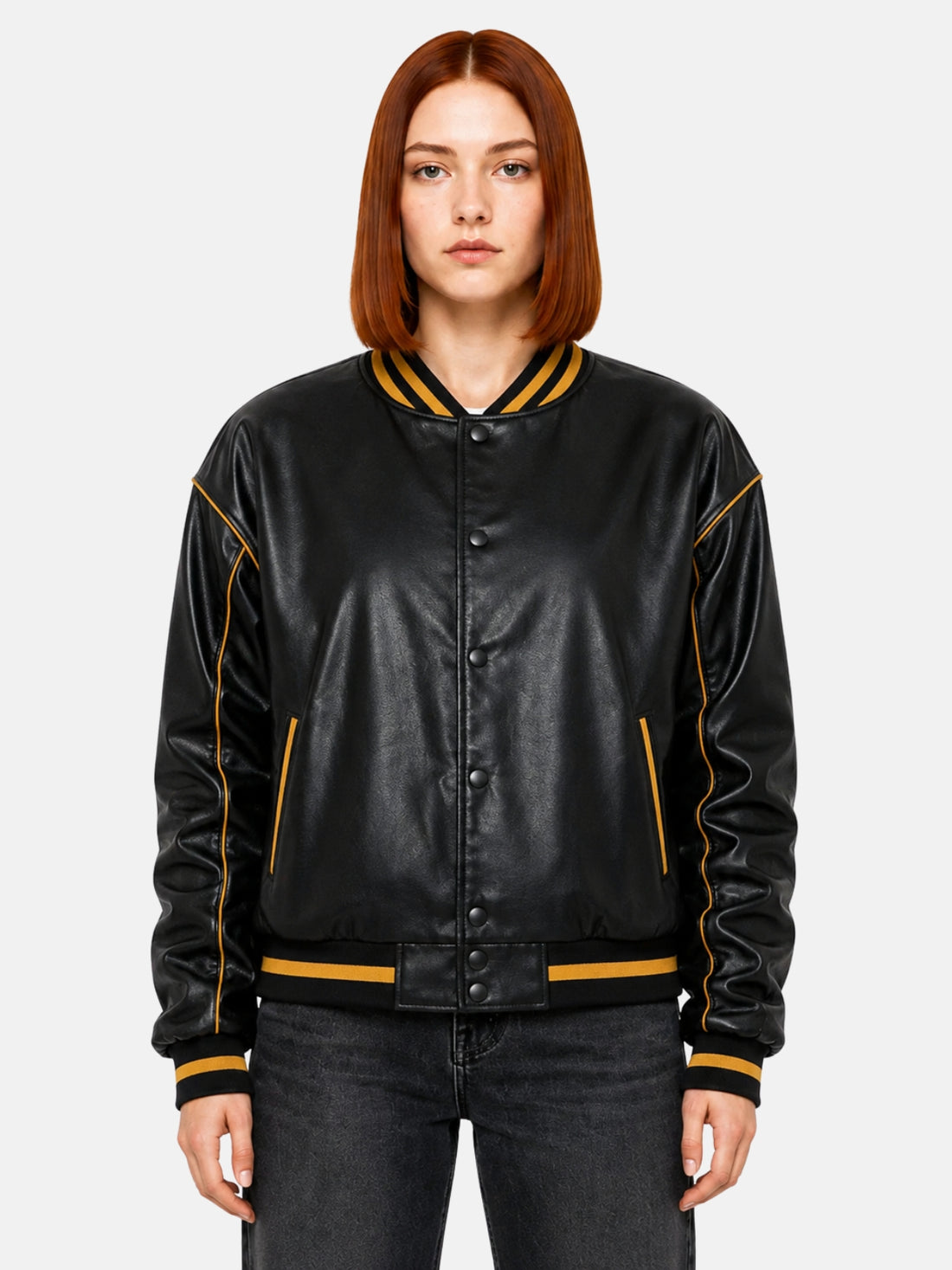 Black leather varsity jacket with gold piping and snap-button front on model