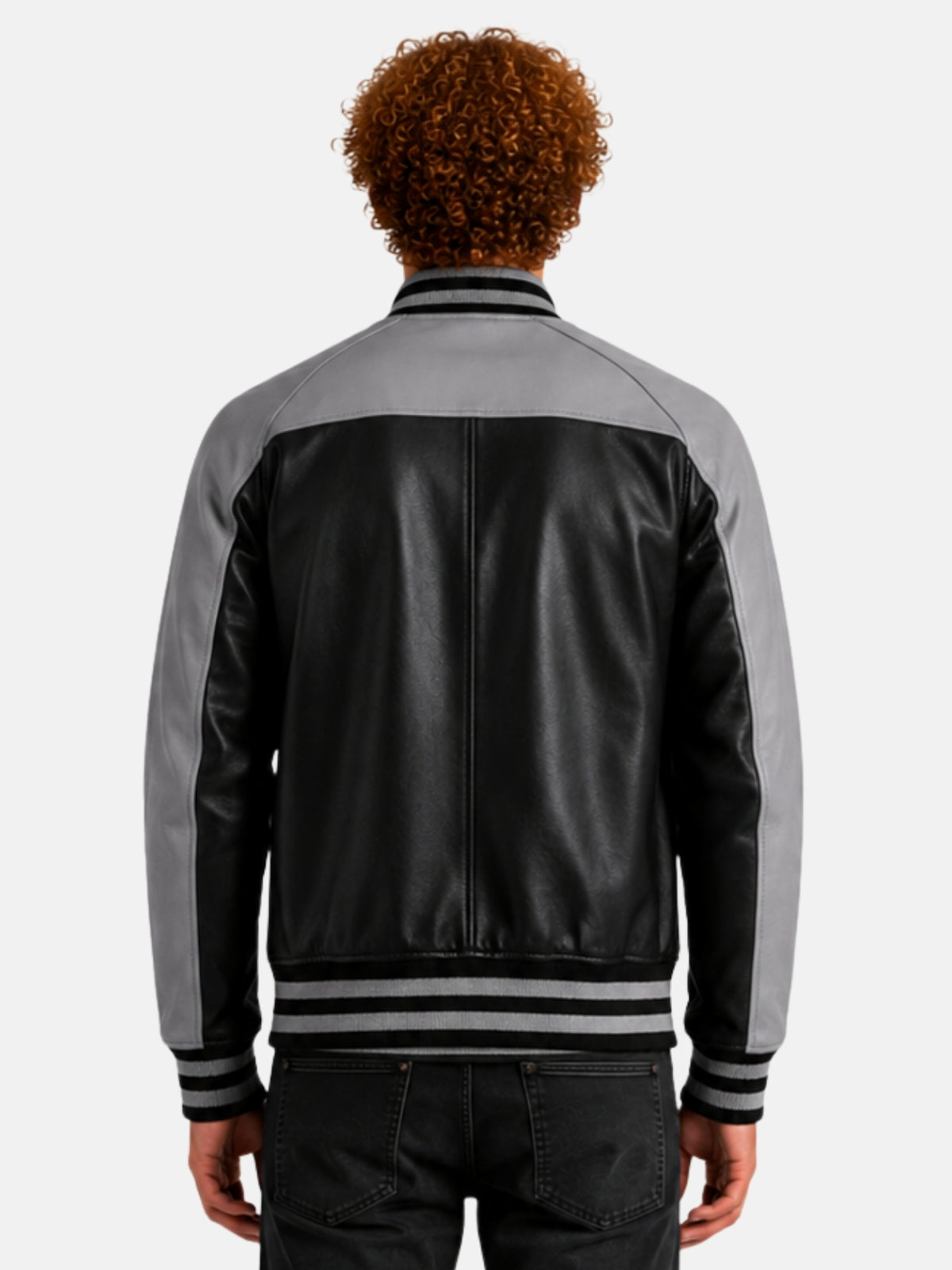 Back view of black leather varsity jacket with grey yoke wrapping the shoulders and upper back