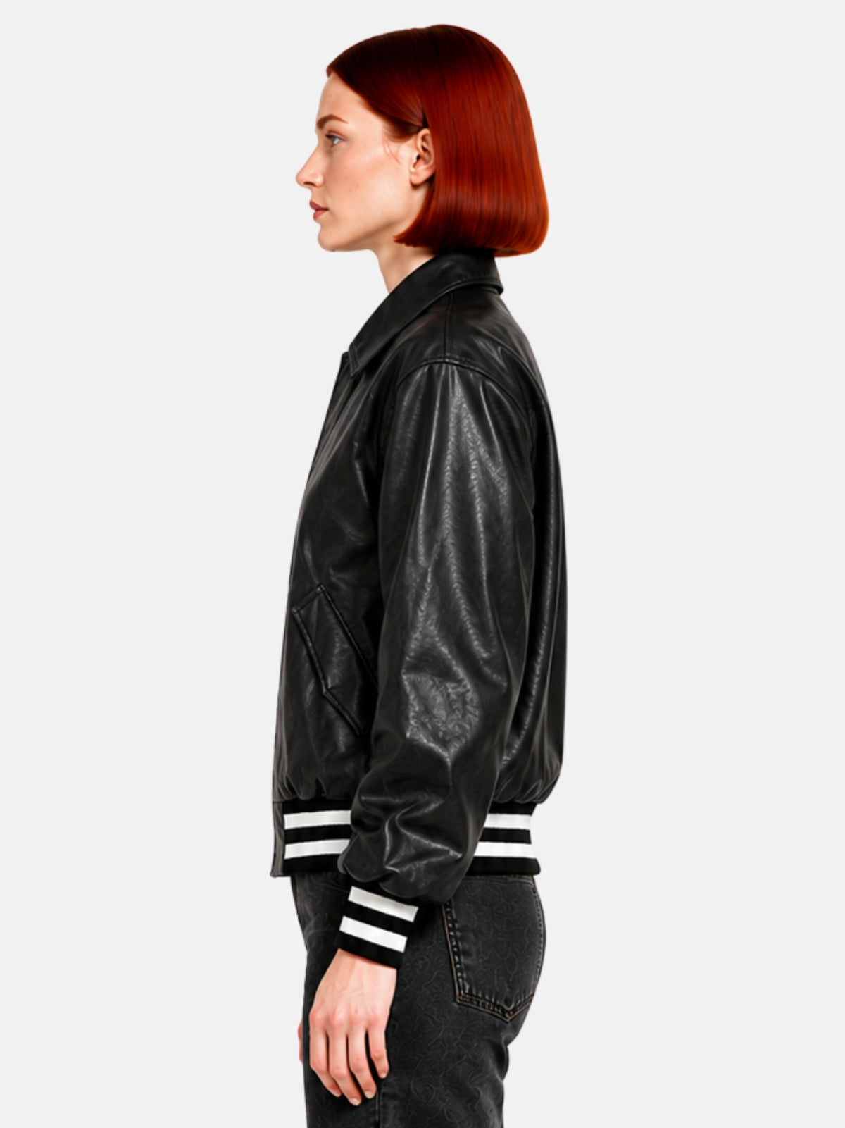 Side profile of black leather jacket with slanted welt pocket and full sleeve volume