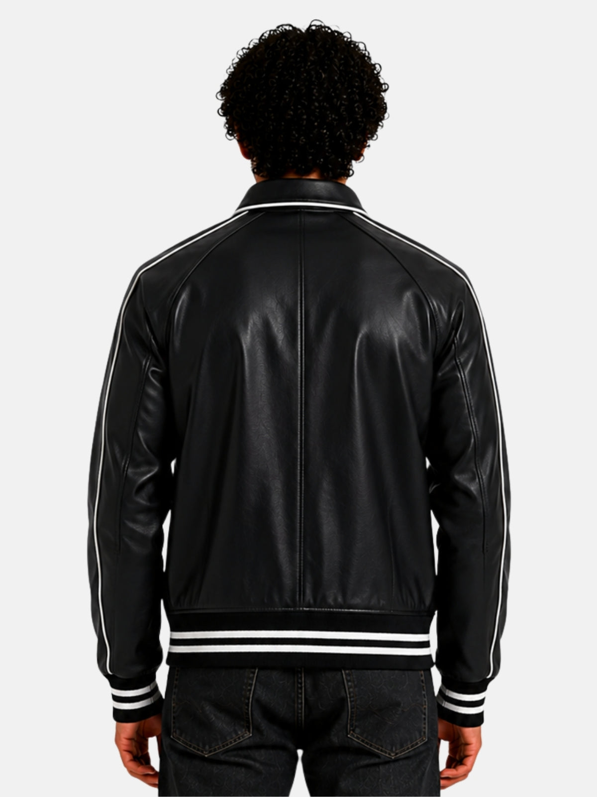 Model showing plain black leather back panel of varsity jacket with piped seams