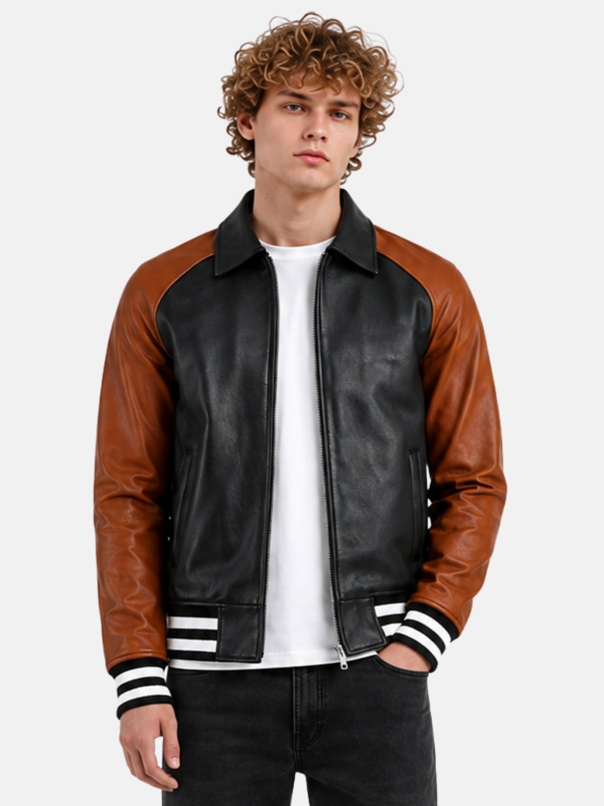 Man wearing black leather varsity jacket with brown raglan sleeves and zip front