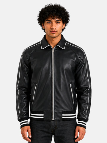Man wearing black leather varsity jacket with white piping and silver zip front