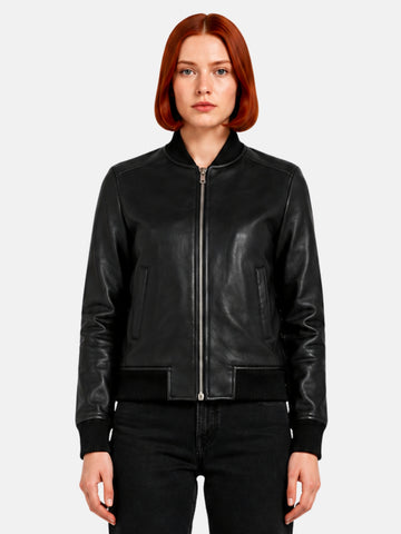 Black leather varsity jacket with silver zip closure and ribbed collar on model