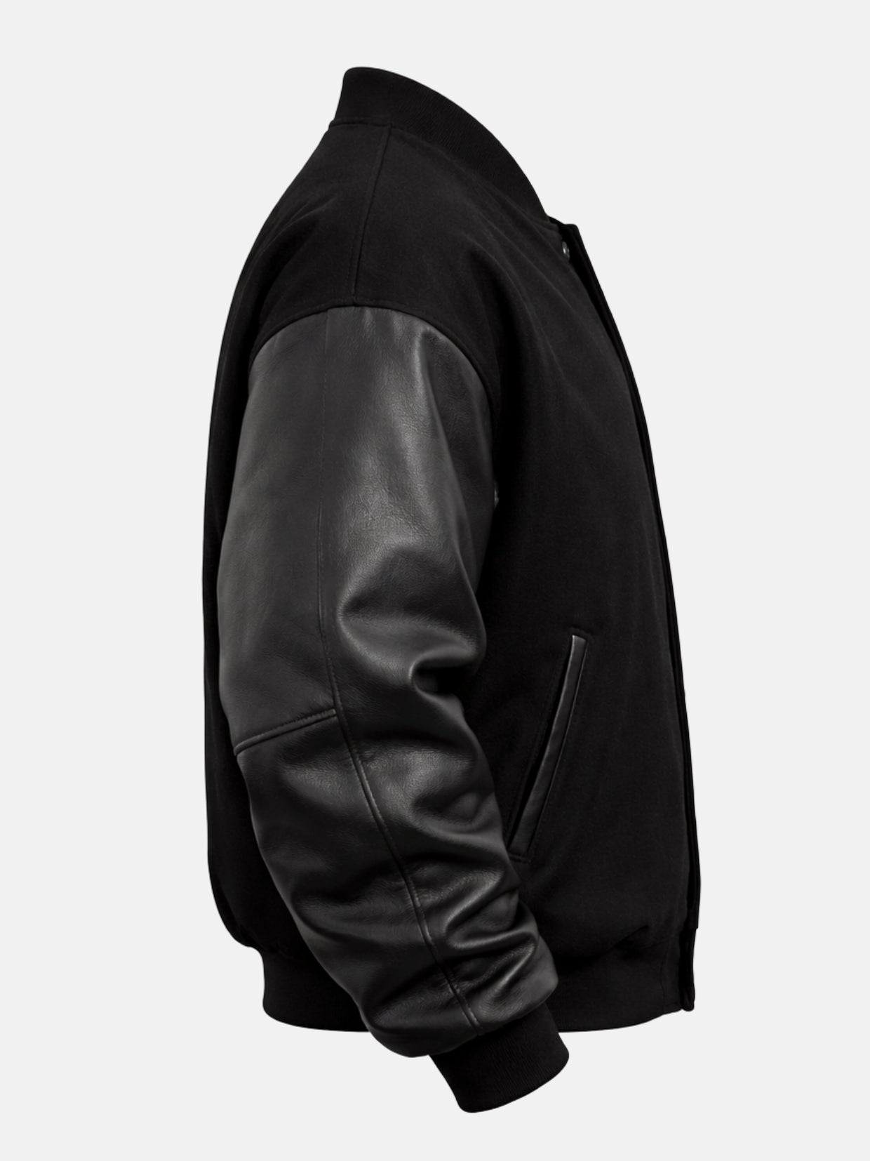 Side flat view of a black letterman jacket with ribbed collar and leather sleeves