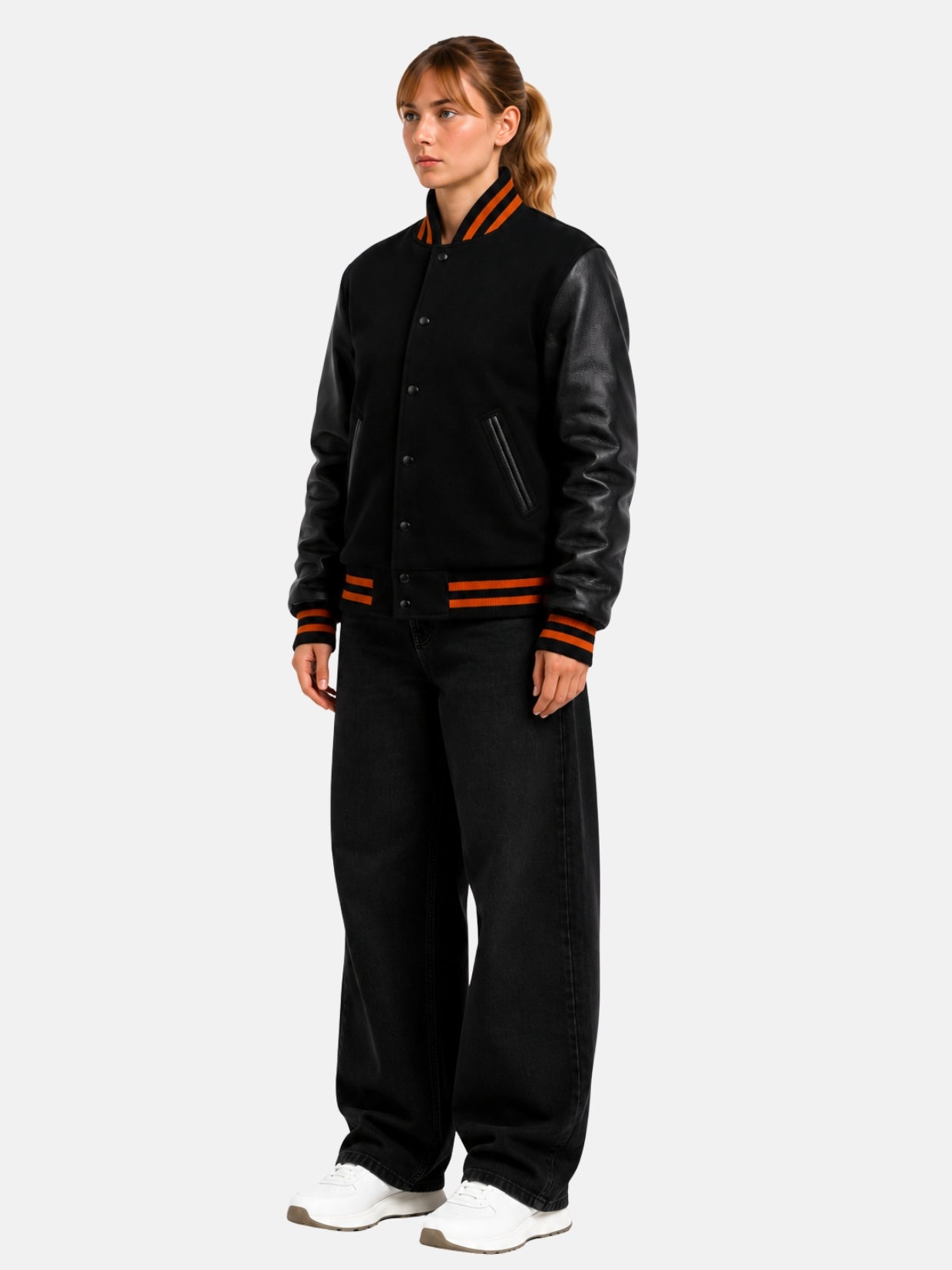 Angled full-body view of black varsity jacket with orange stripe trim