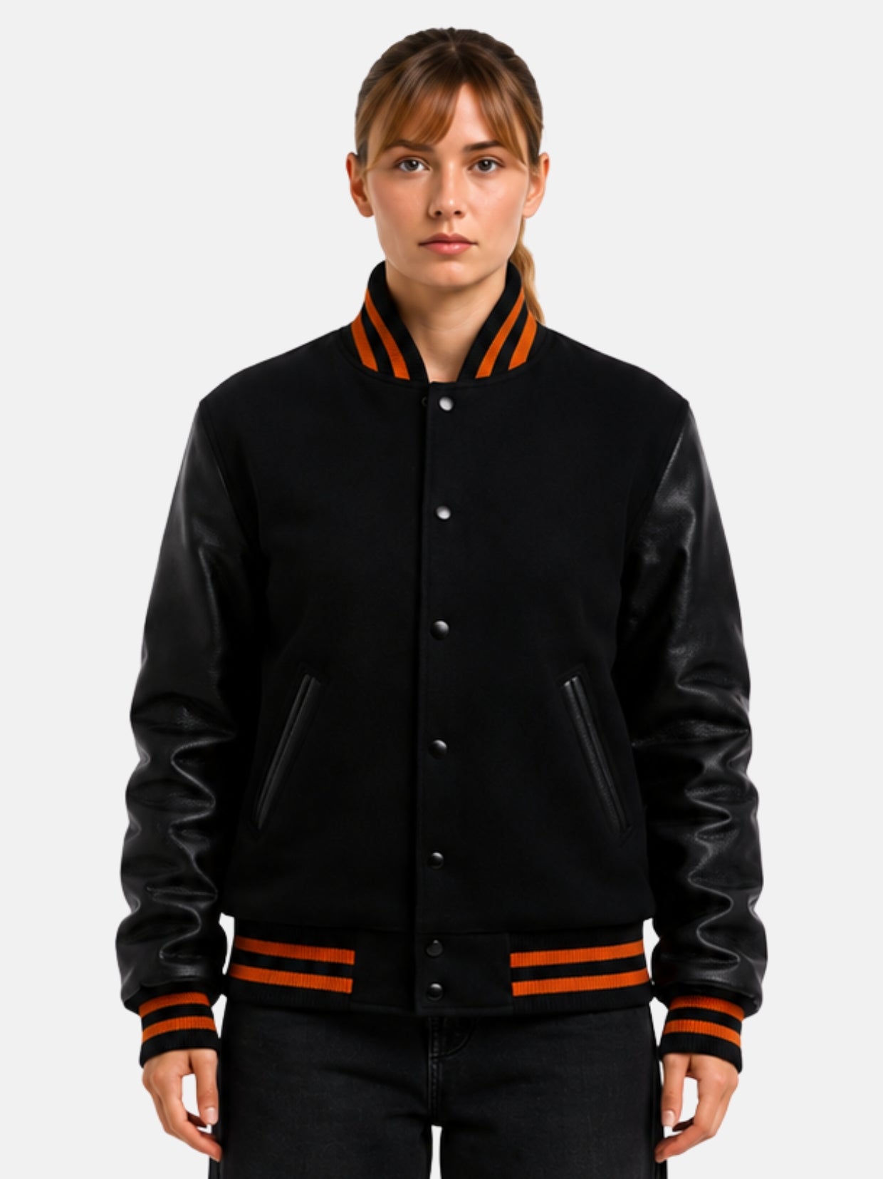 Black wool varsity jacket with leather sleeves and orange ribbed trim