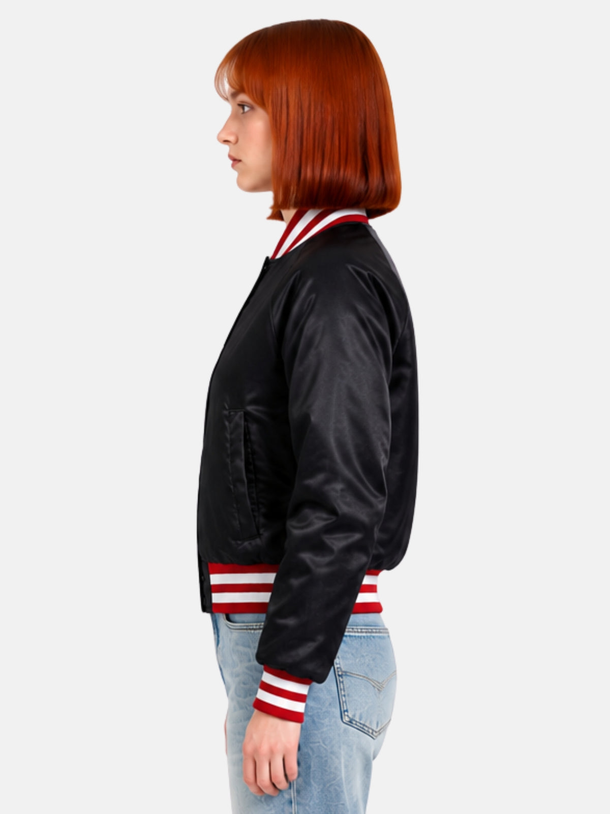 Side profile of black satin jacket showing red and white ribbed cuff