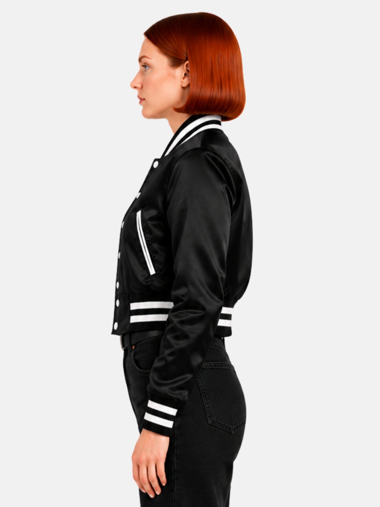 Side profile of black satin jacket with white ribbed collar and cuff trim