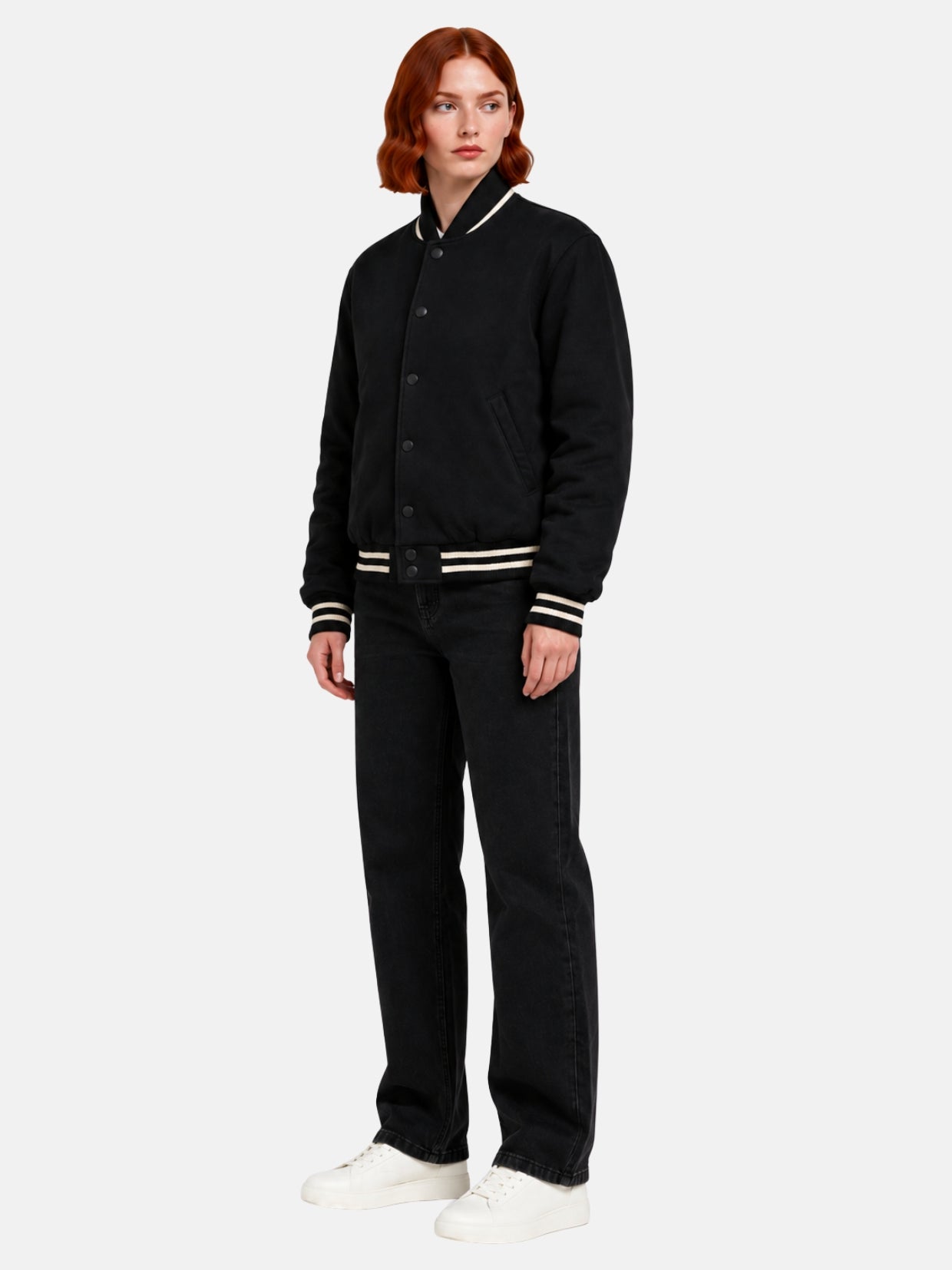 Angled full-body view of oversized black suede letterman jacket