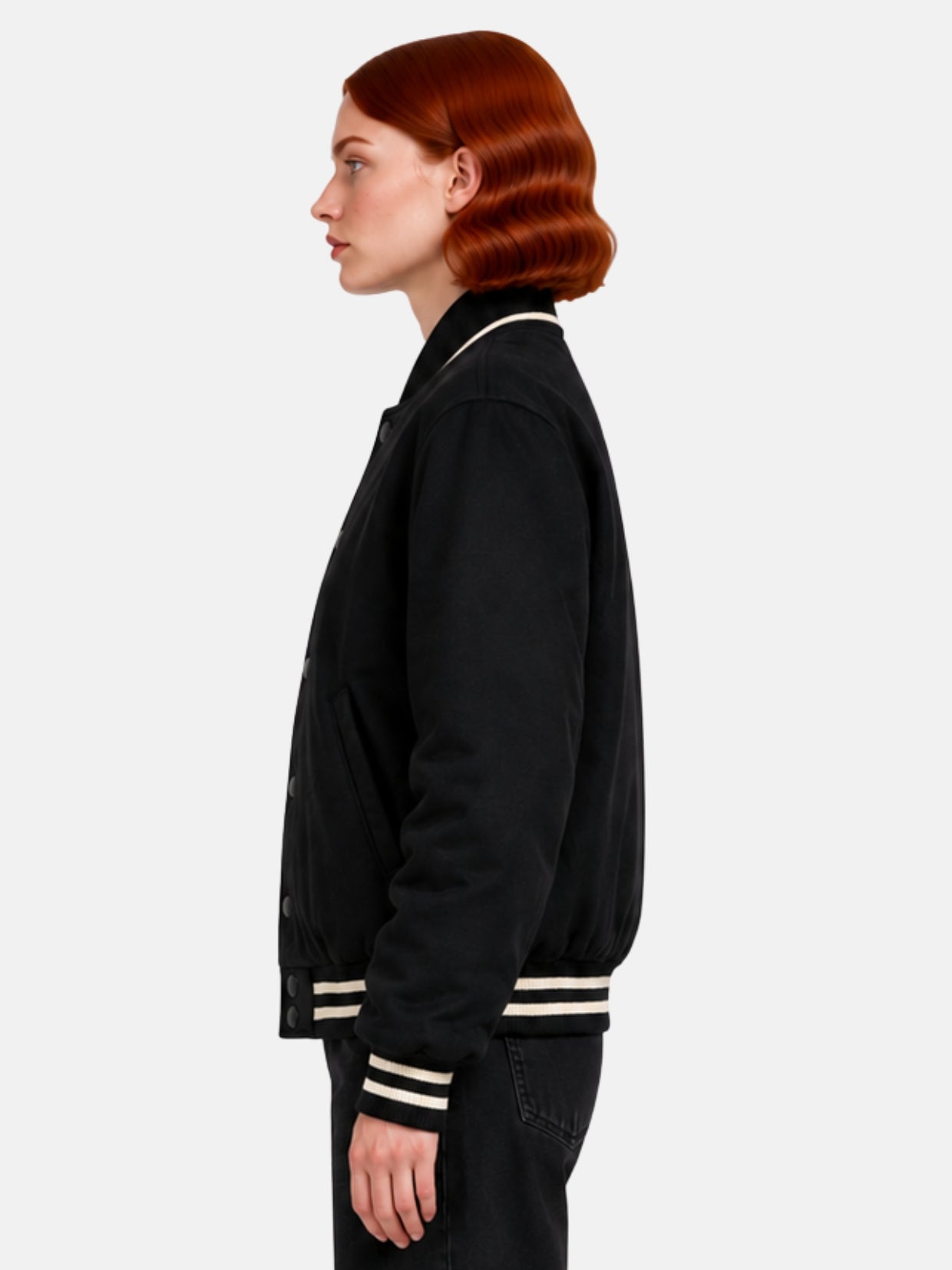 Side profile of black suede jacket showing cream cuff stripe detail