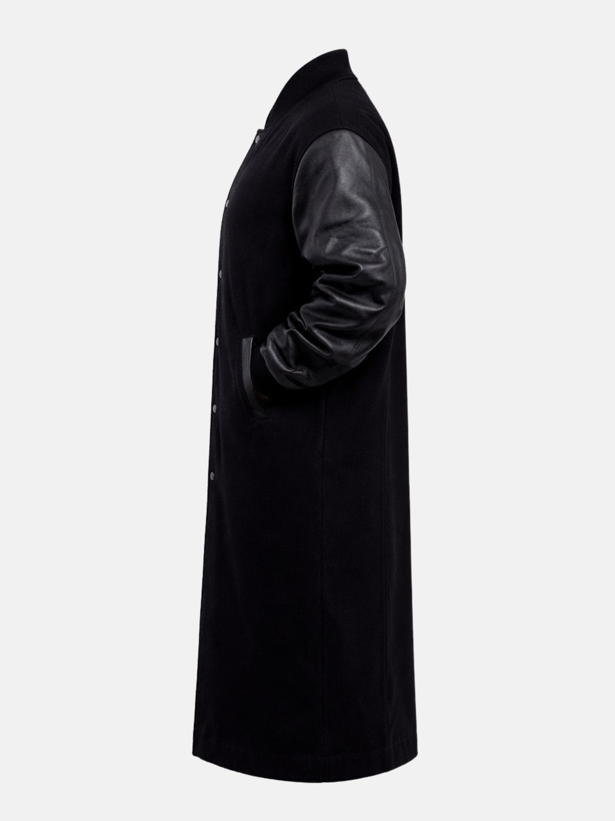 Side flat view of black longline varsity coat showing leather sleeve and welt pocket