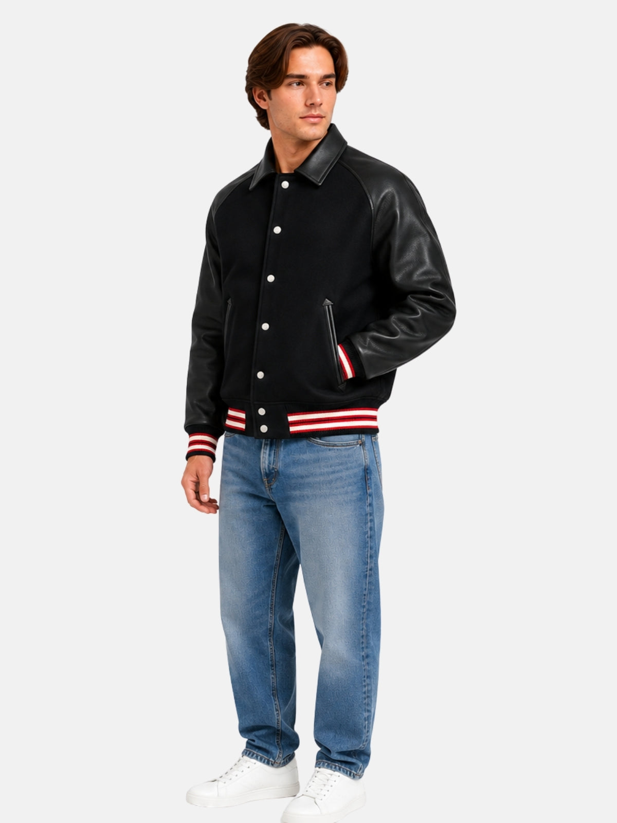 Full-length look with black wool varsity jacket, light-wash jeans and white sneakers