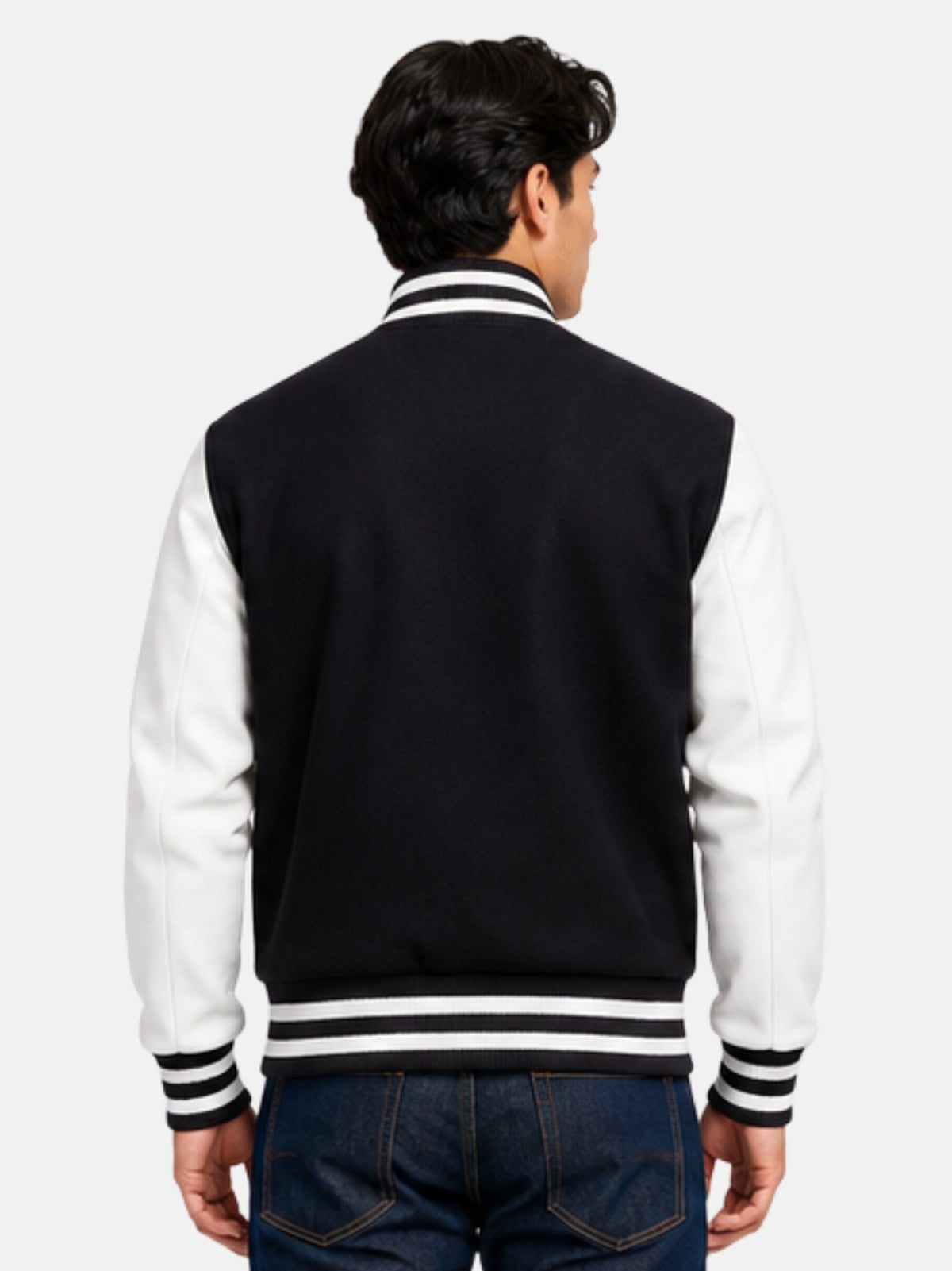 Model showing plain black back panel of varsity jacket with white cowhide sleeves