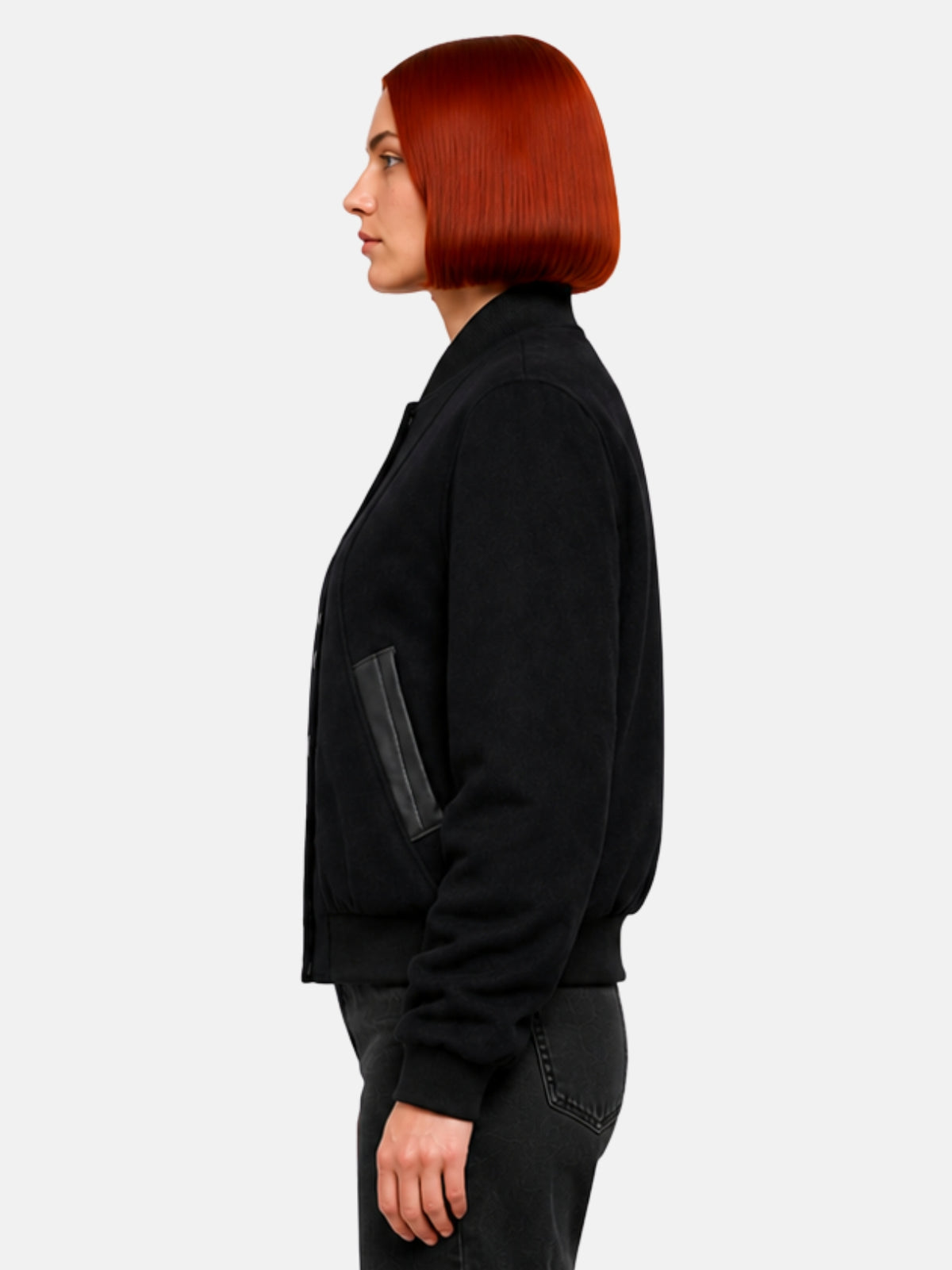 Side profile of black wool jacket showing leather-trimmed welt pocket