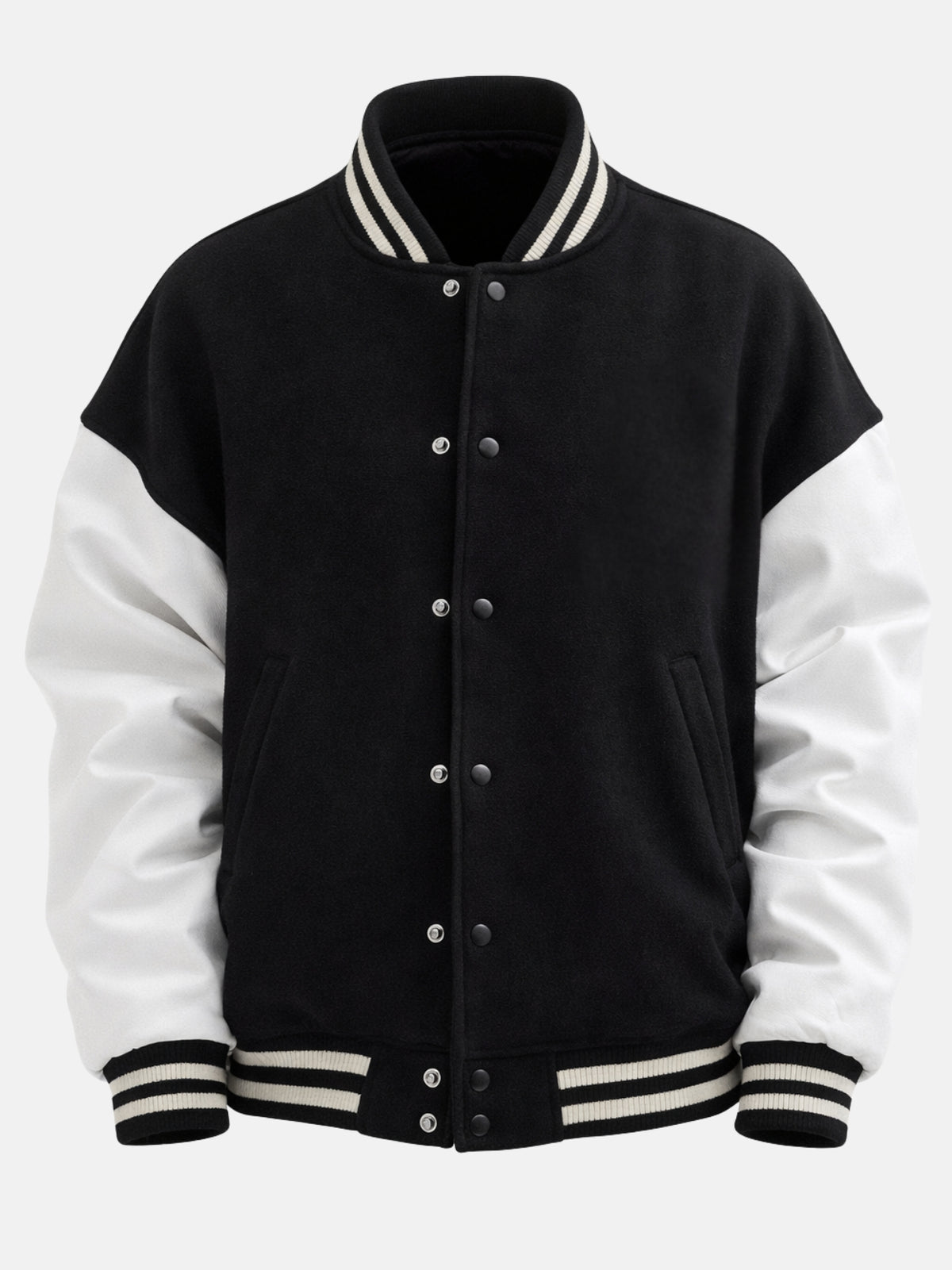 Oversized black wool varsity jacket with white leather sleeves, snap front and hem tabs