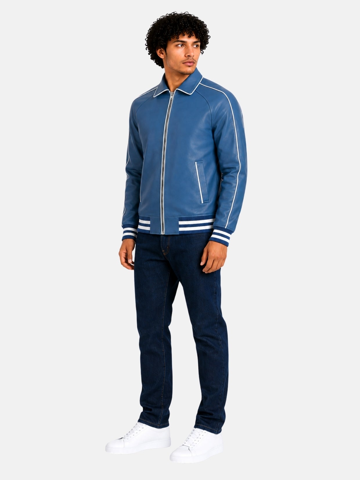 Full-length outfit with blue leather letterman jacket and dark denim