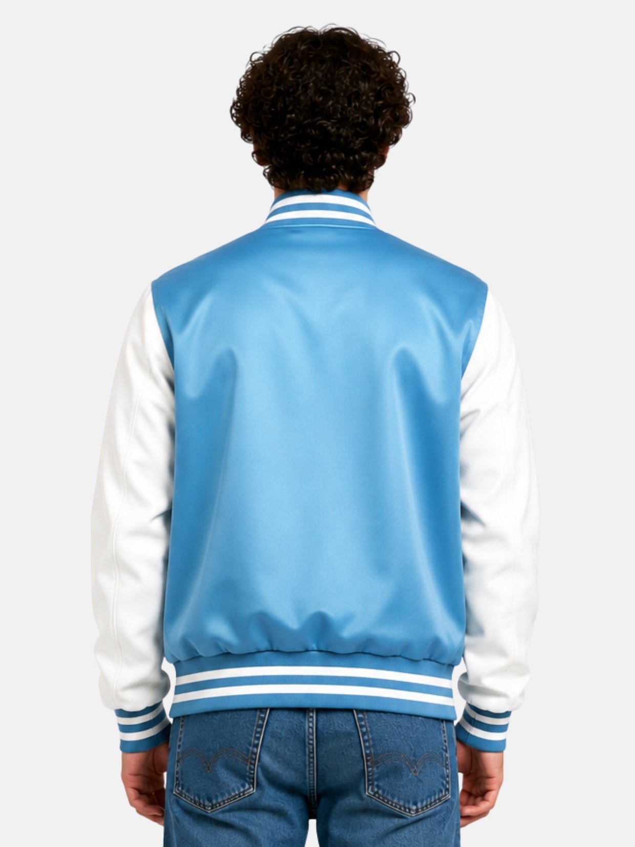 Back view of a blue satin varsity jacket with striped rib collar and hem on model