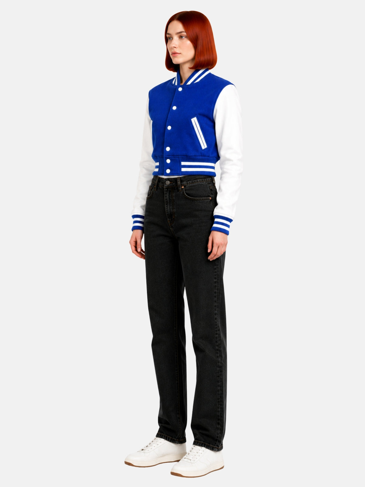 Full-body three-quarter shot of model walking in the blue and white jacket, white sneakers