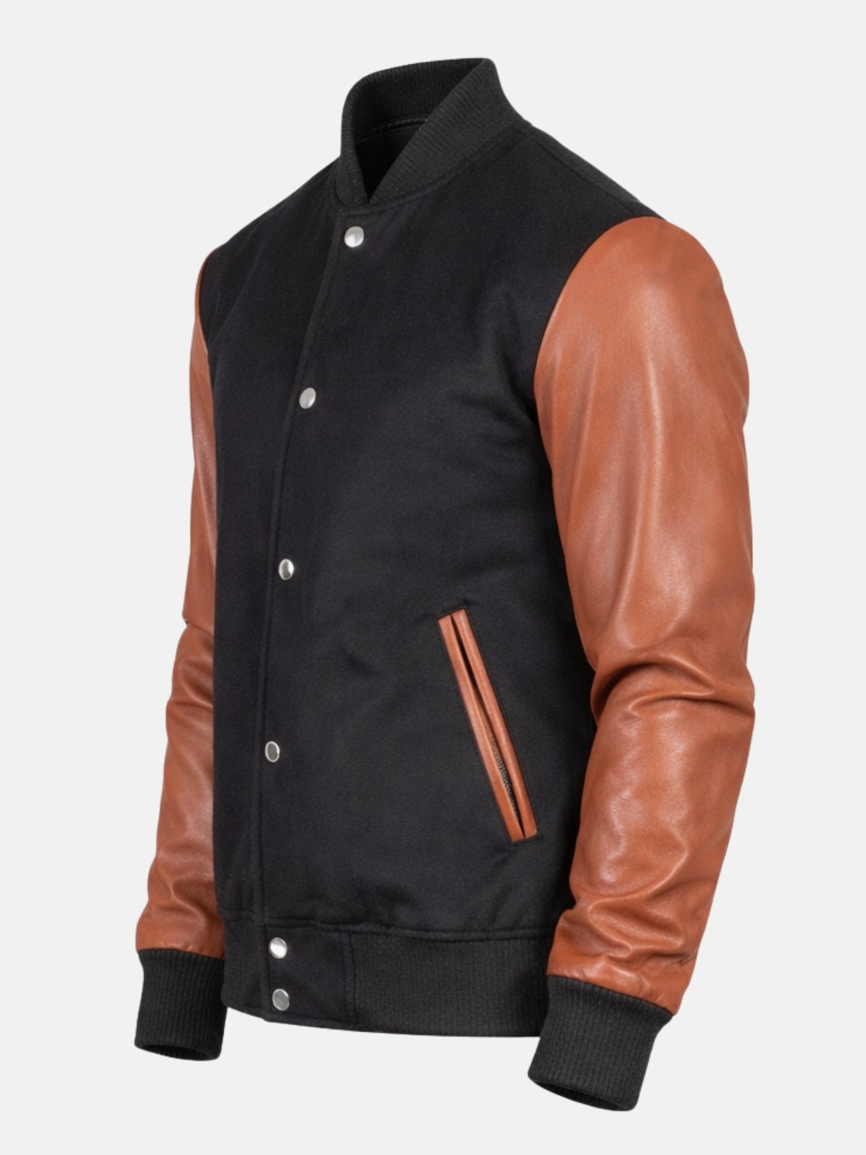 Angled view of black college jacket with brown leather sleeves and snap placket