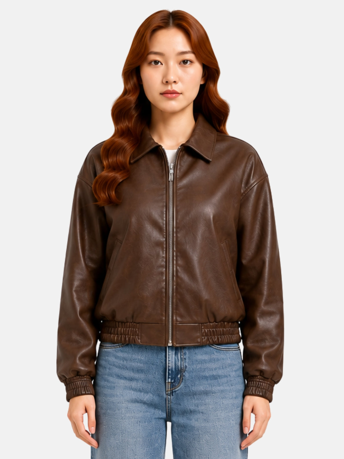 Brown leather jacket with pointed collar and cinched elastic waist on model