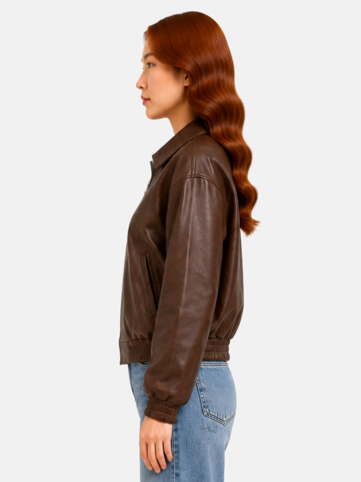Side profile of brown leather jacket showing shirred elastic cuff and welt pocket