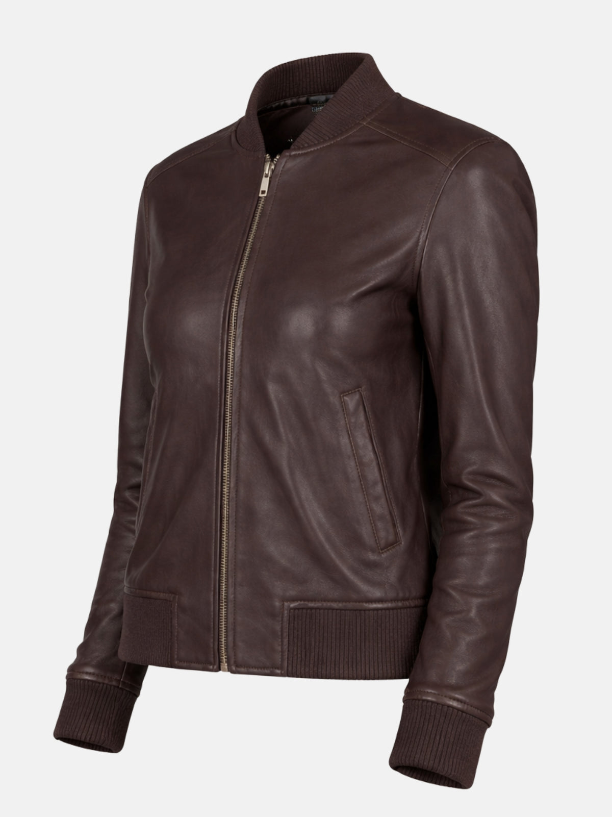 Angled flat lay of brown leather jacket showing gold zipper pull and ribbed cuff