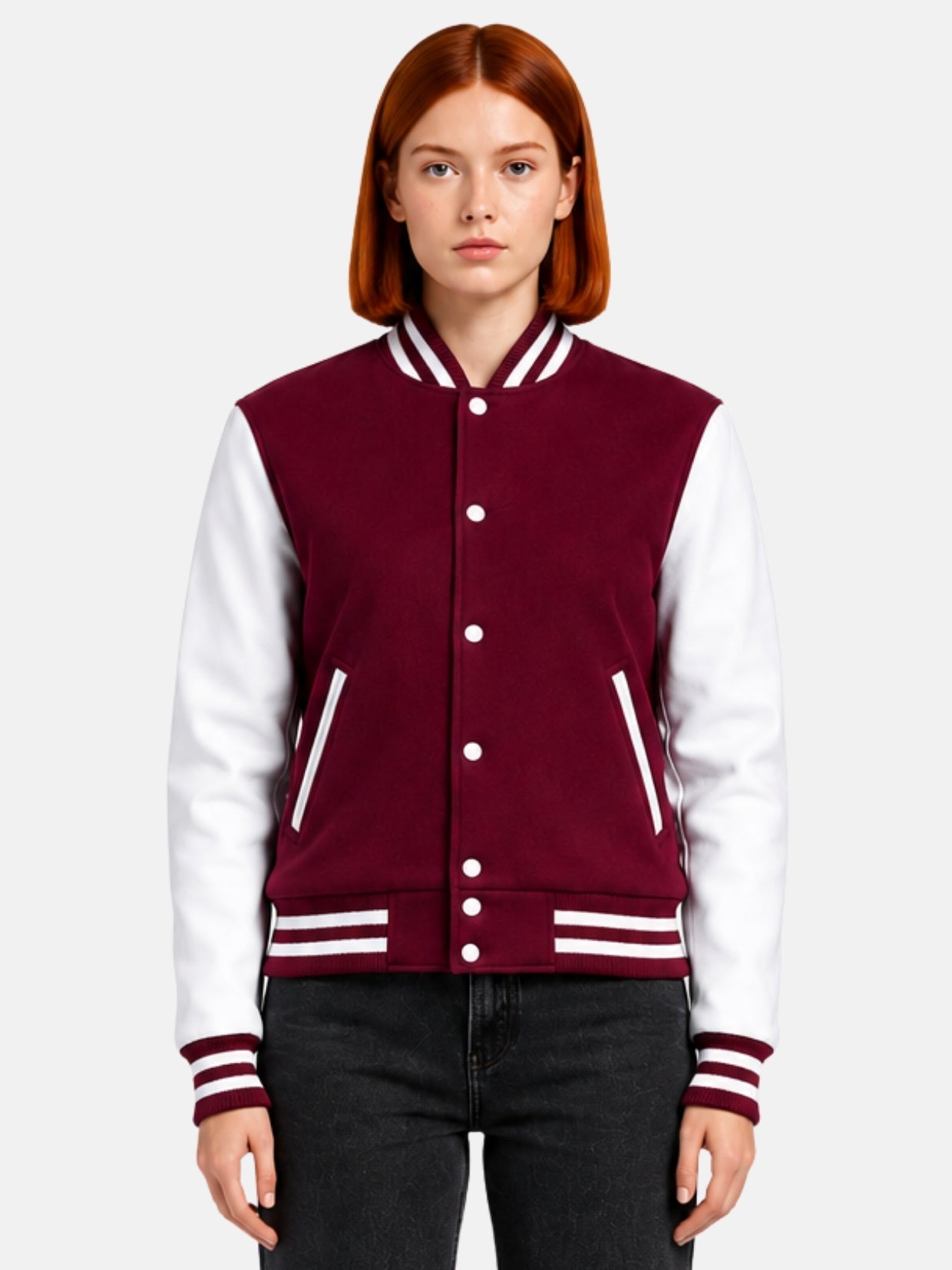 Woman wearing a burgundy varsity jacket with white leather sleeves and striped rib trims