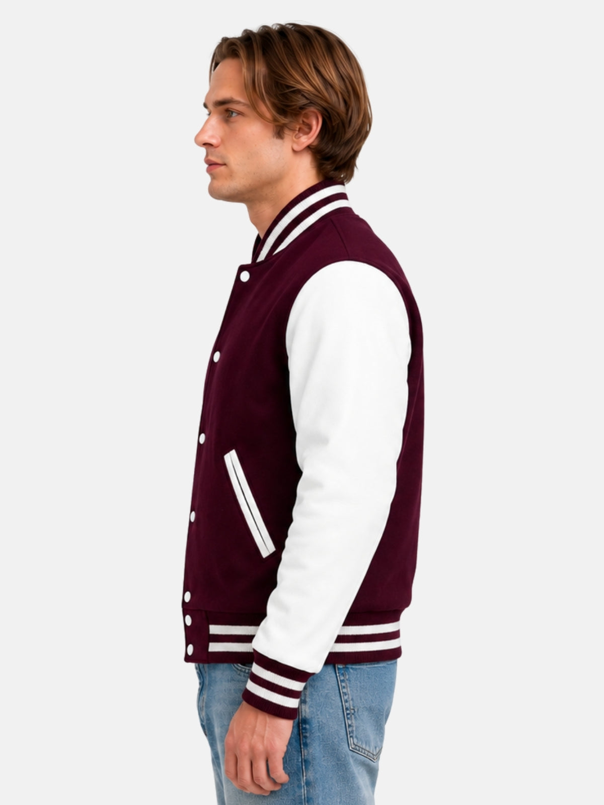Side profile of maroon wool baseball-collar jacket with white leather sleeve on model