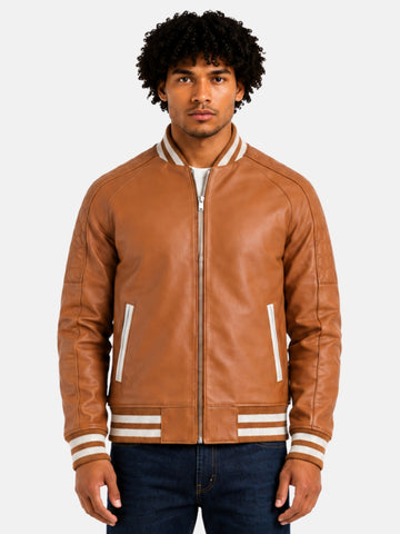 Man wearing camel leather letterman jacket with cream striped collar and zip front