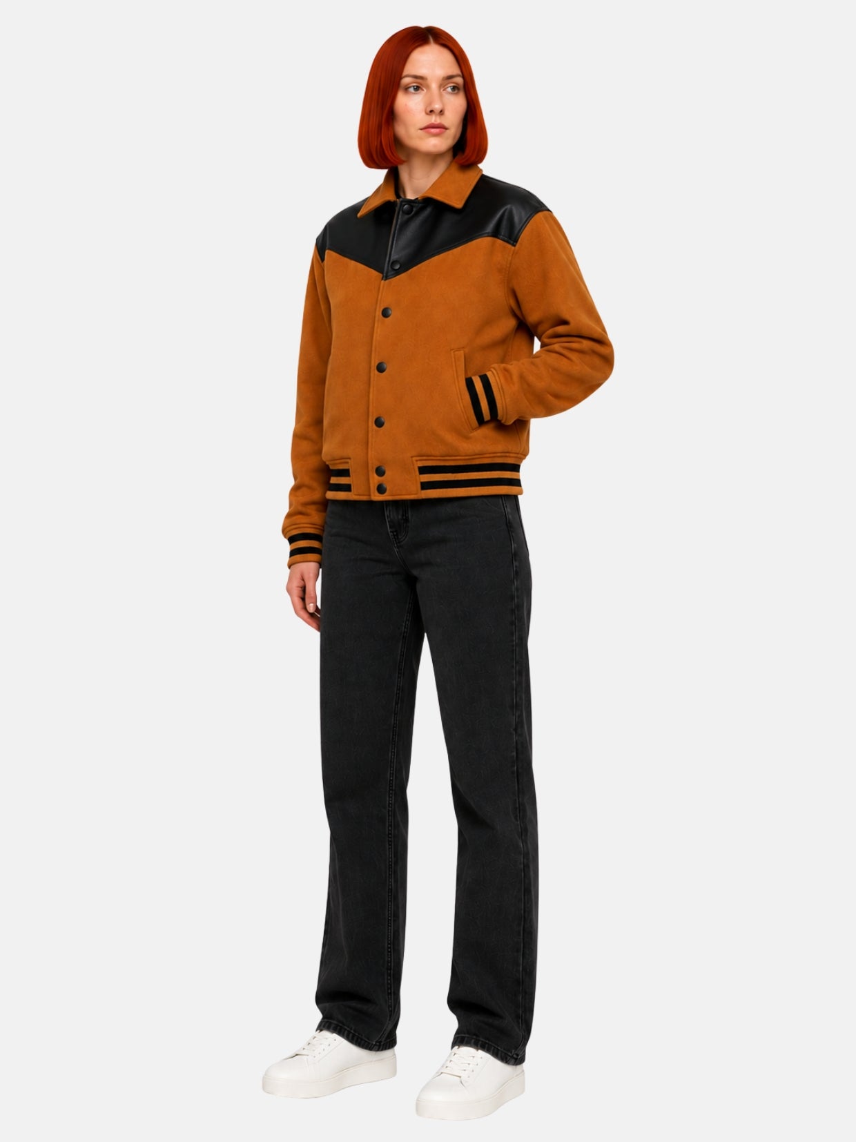 Full-length view of camel wool jacket with leather yoke over black jeans