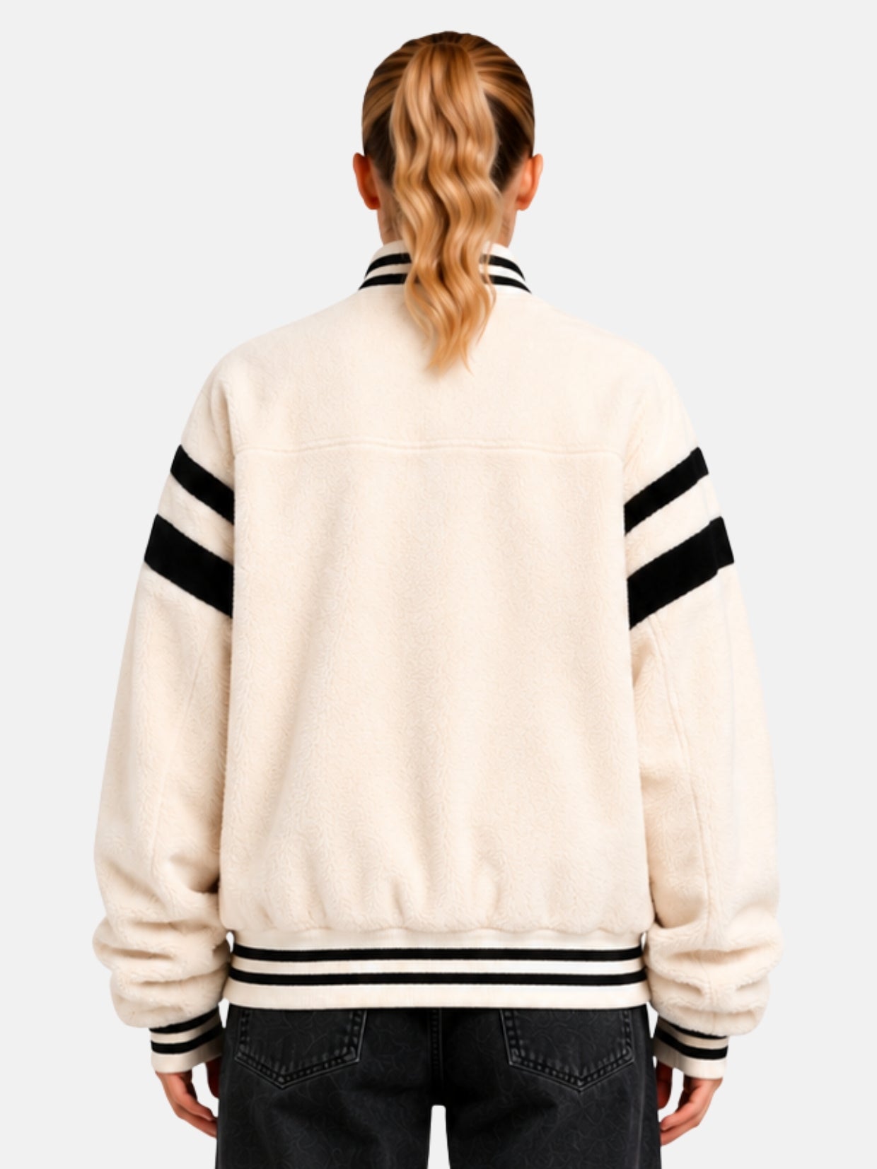 Back view of cream sherpa fleece jacket with black ribbed collar and yoke seam