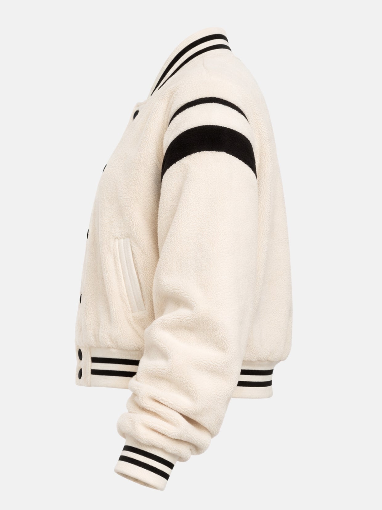 Flat lay side view of cream sherpa varsity jacket with ribbed cuff detail