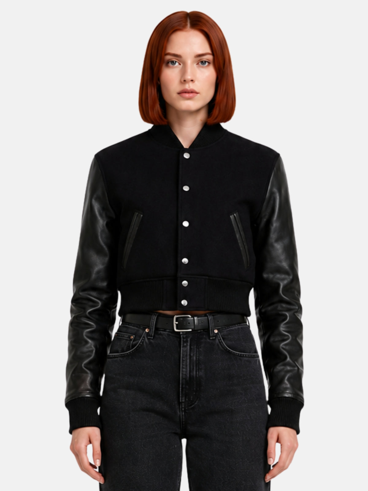 Black cropped varsity jacket with leather sleeves and silver snaps, worn open-collar on model
