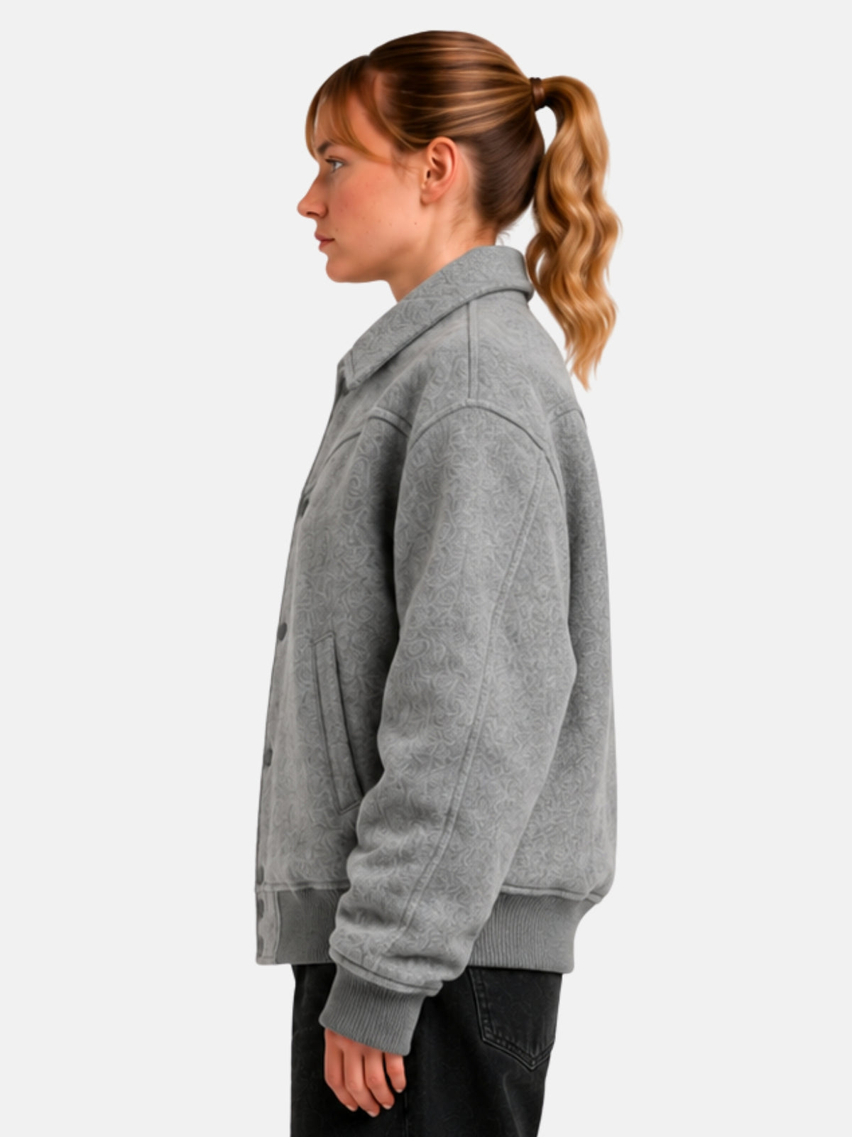 Side profile of gray wool jacket showing western yoke seam and welt pocket